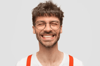 https://chicclinics.me/wp-content/uploads/2023/02/positive-bearded-man-hipster-smiles-broadly-has-pleased-expression-laughs-something-funny-closes-eyes_273609-16781-320x213.png